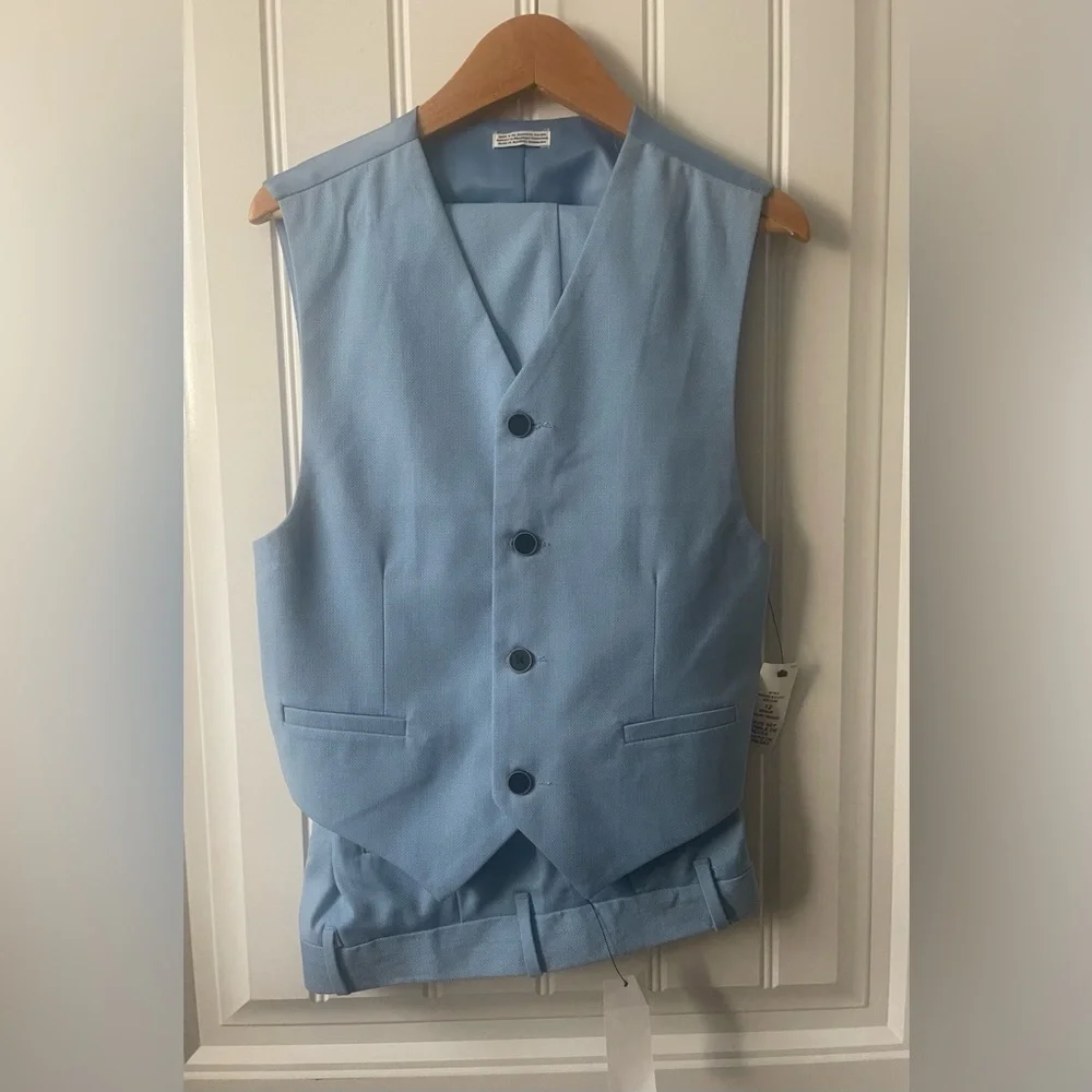 Calvin Klein 
Boys 3 piece suit 
NWT 
Size 10 jacket / size 12 vest and pants - Picture 3 of 6